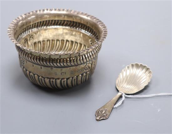 A late Victorian silver sugar bowl and a modern silver caddy spoon.